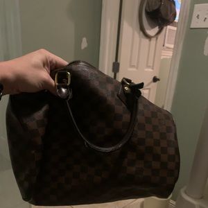 Louis Vuitton speedy tote perfect condition.